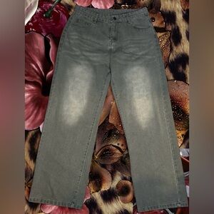 Dark gray wide leg jeans with a relaxed fit